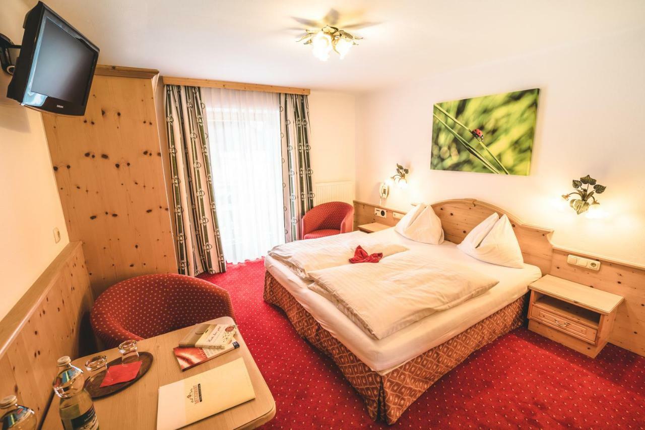 Hotel Metzgerwirt Кирхберг ин Тирол Екстериор снимка